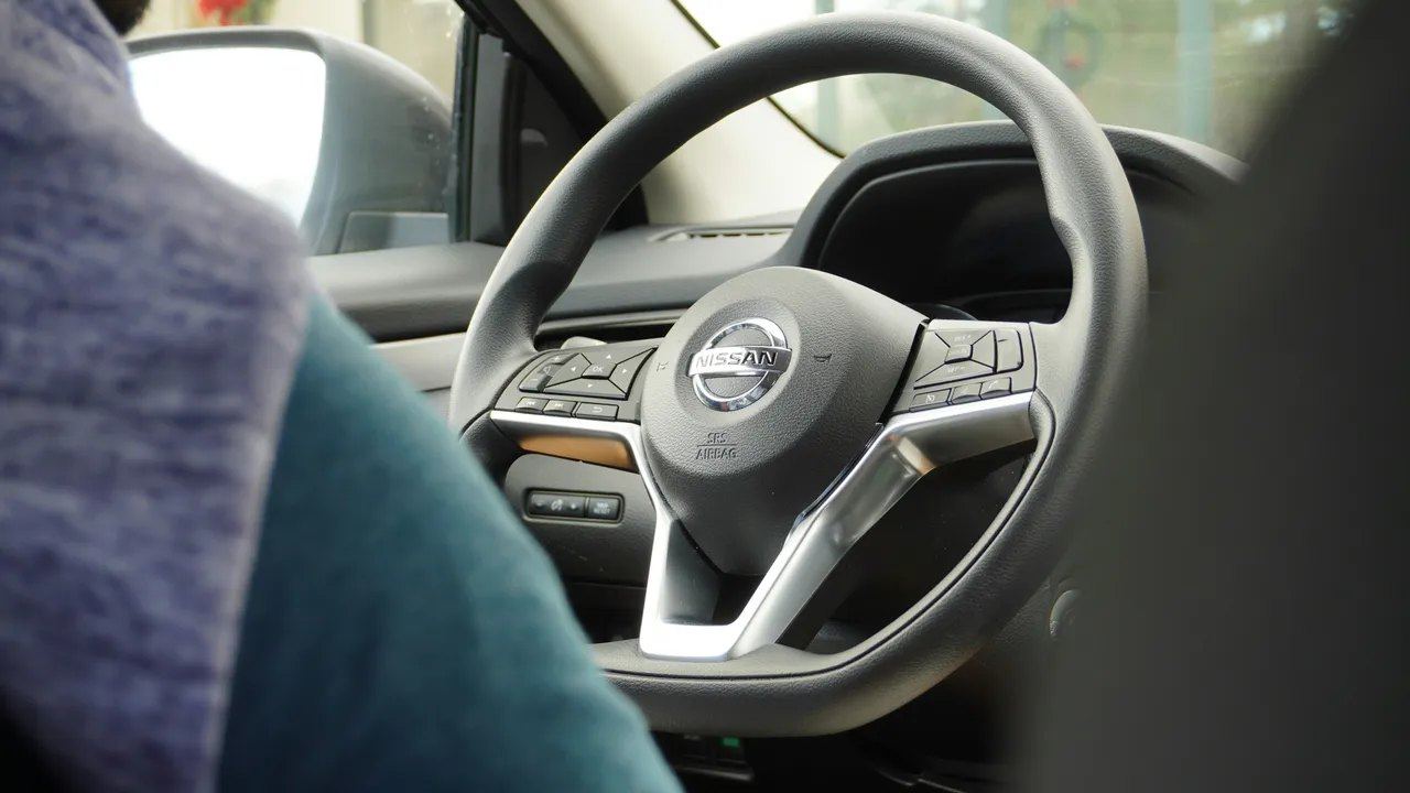 Customer reviewing a Driven car subscription vehicle on the Gold Coast or in Brisbane